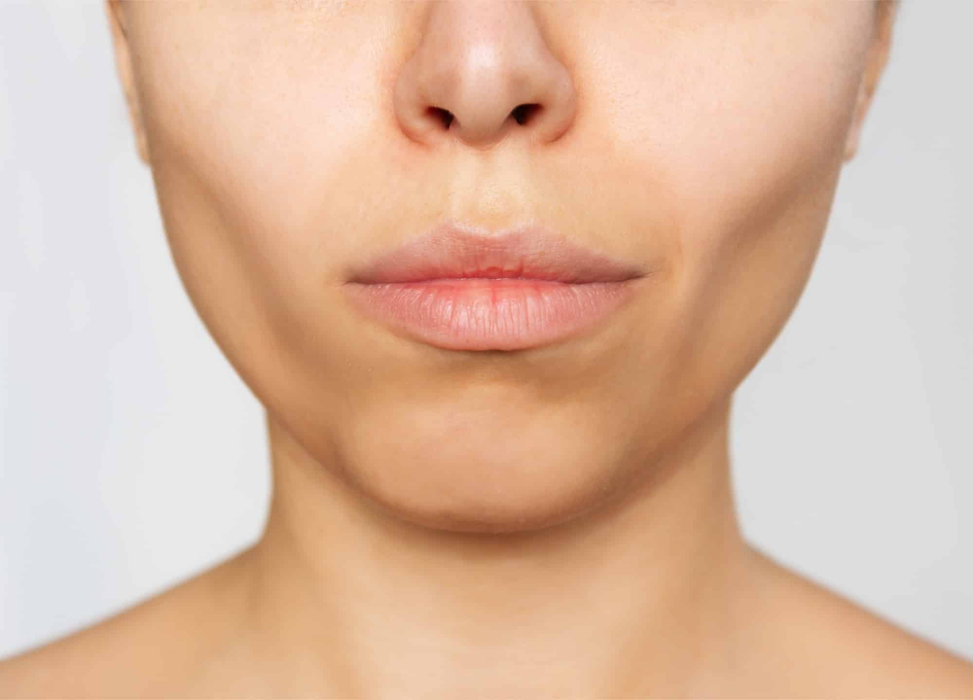 Close up of woman's face with sculpted cheekbones